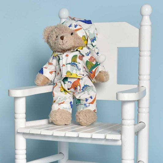 Teddy Bear Wearing Colourful Dinosaur Pyjamas And Nightcap